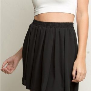 Brandy Melville Black flirty skirt